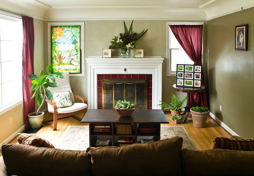 Organized living room with natural colors and plants by ReSPACEd Professional Organizing in Portland