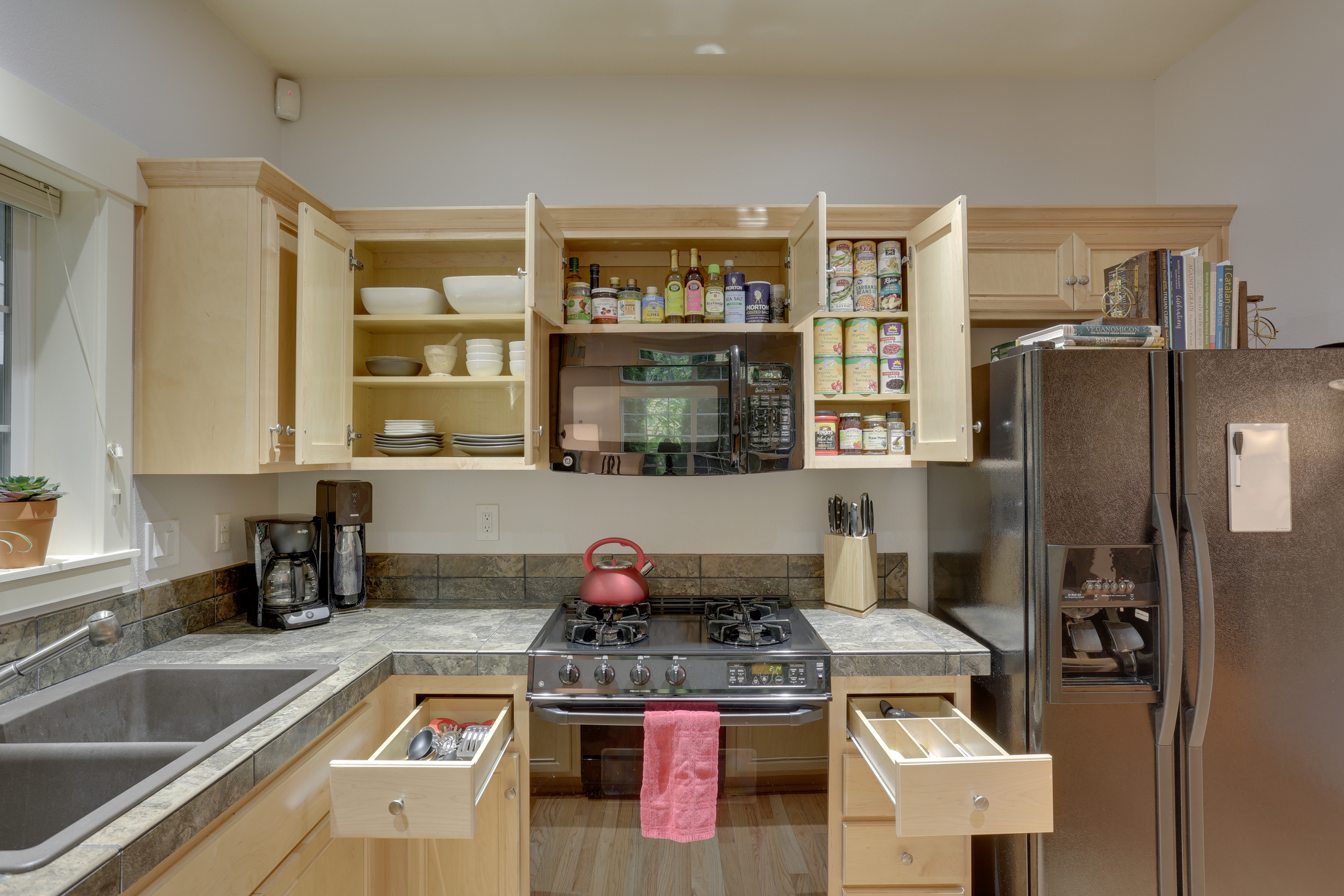 An unpacked and organized kitchen by ReSPACEd Professional Organizing in Portland
