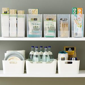 Kitchen containers masterfully holding kitchen items like flour, water, and snacks